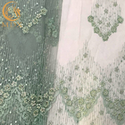 손으로 만드는 녹색 메쉬 절묘한 비즈는 드레스 제작을 위한 구성을 끈으로 묶습니다